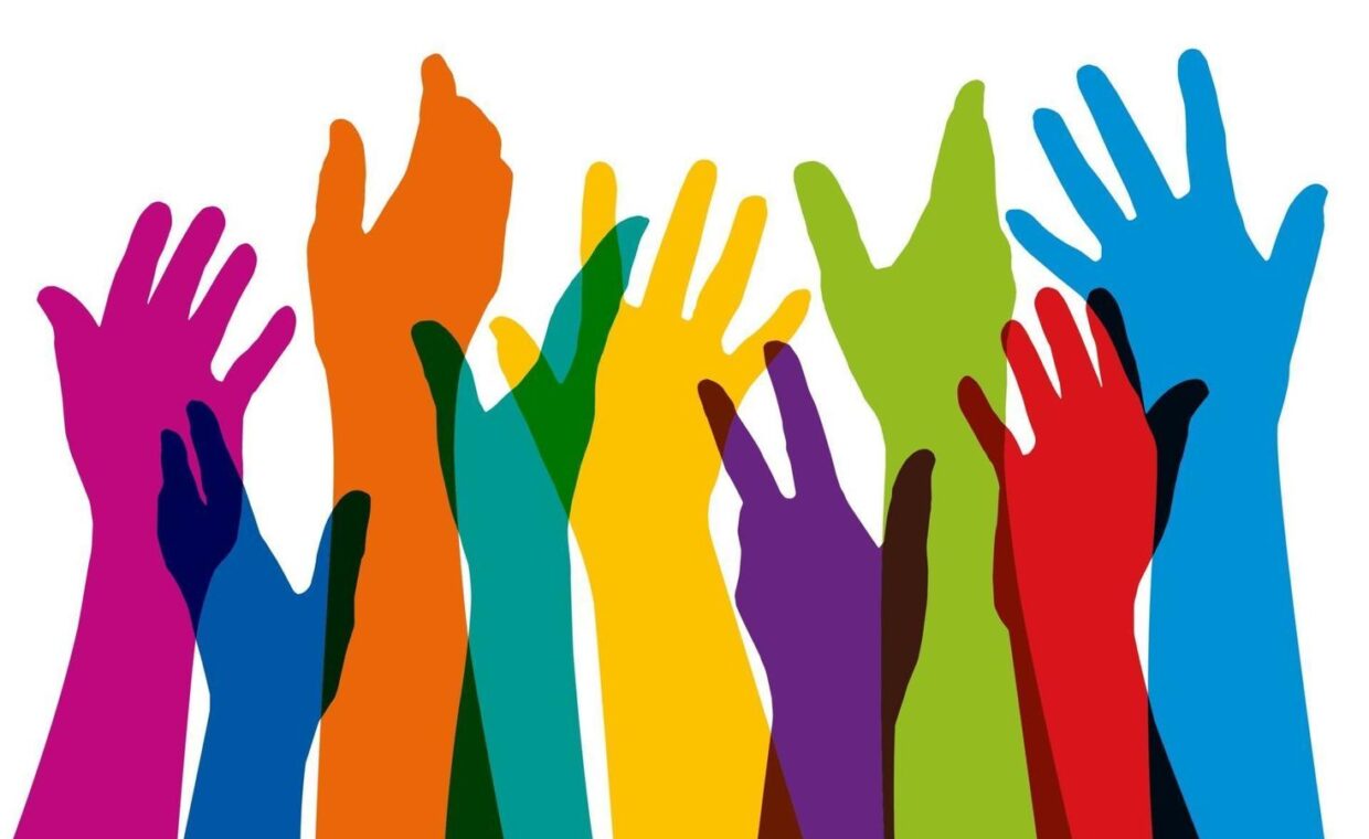 2184609-mani-alzate-di-colori-diversi-simbolo-di-unita-vettoriale