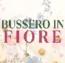 scritta bussero in fiore su sfondo floreale