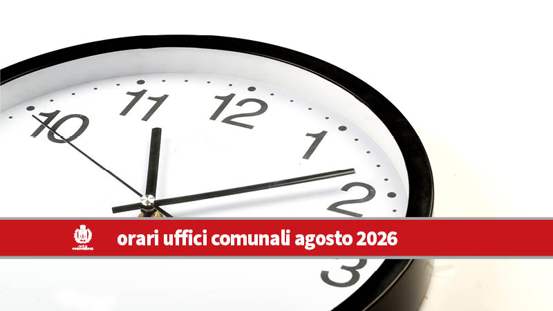 Particolare di orologio da muro con lancette e numeri arabi