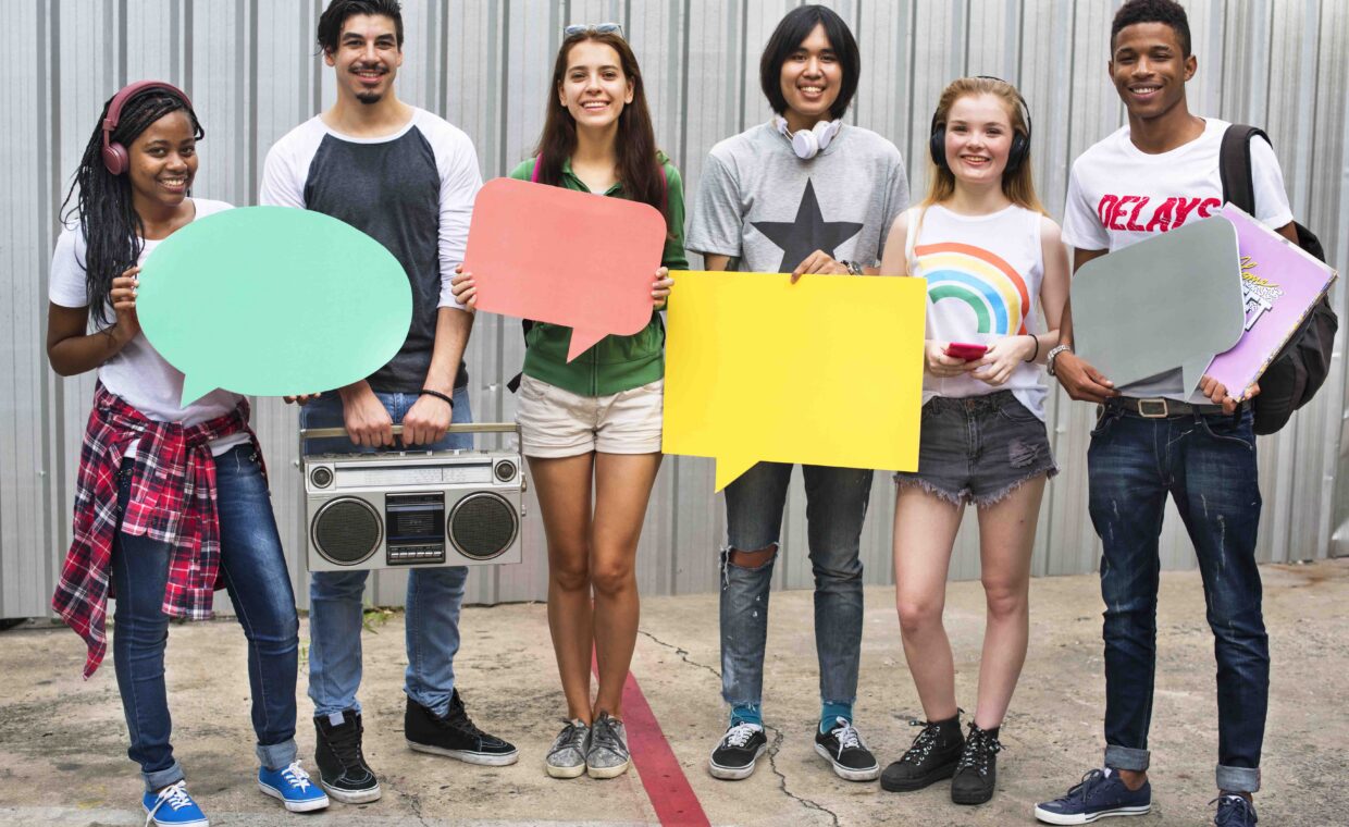 Diverse Group People Holding Speech Bubble Concept