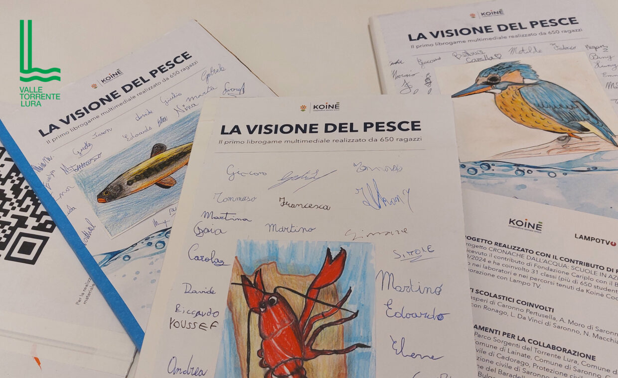La visione del pesce foto del libro cartaceo con disegni dei bambini