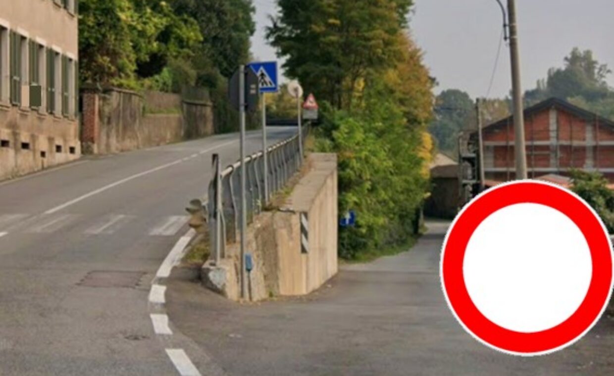 Immagine generica dell'ingresso di via Viganò con un cartello di divieto di transito