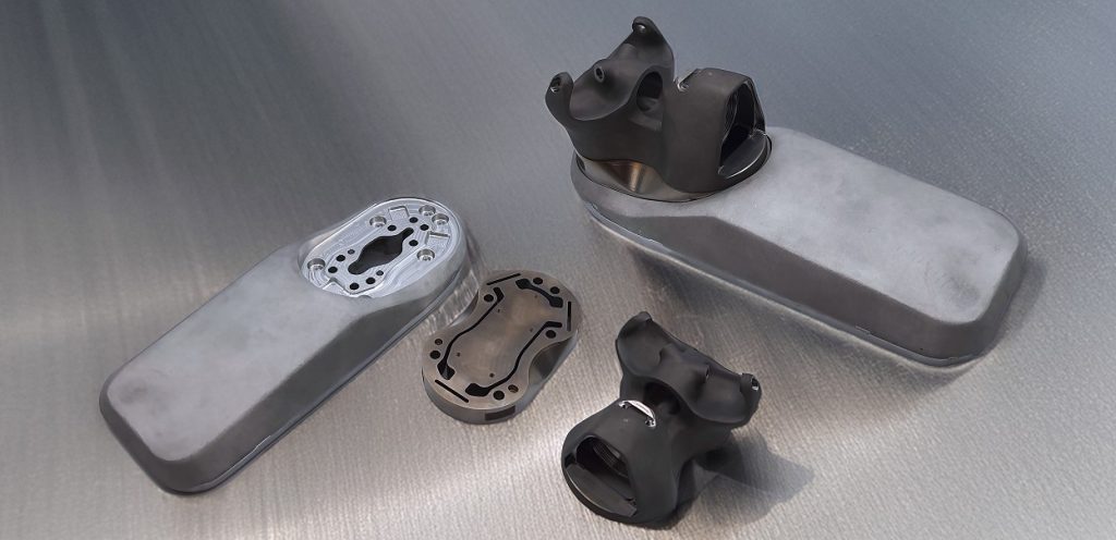 Componenti stampati in 3D validati in volo e produzione ibrida